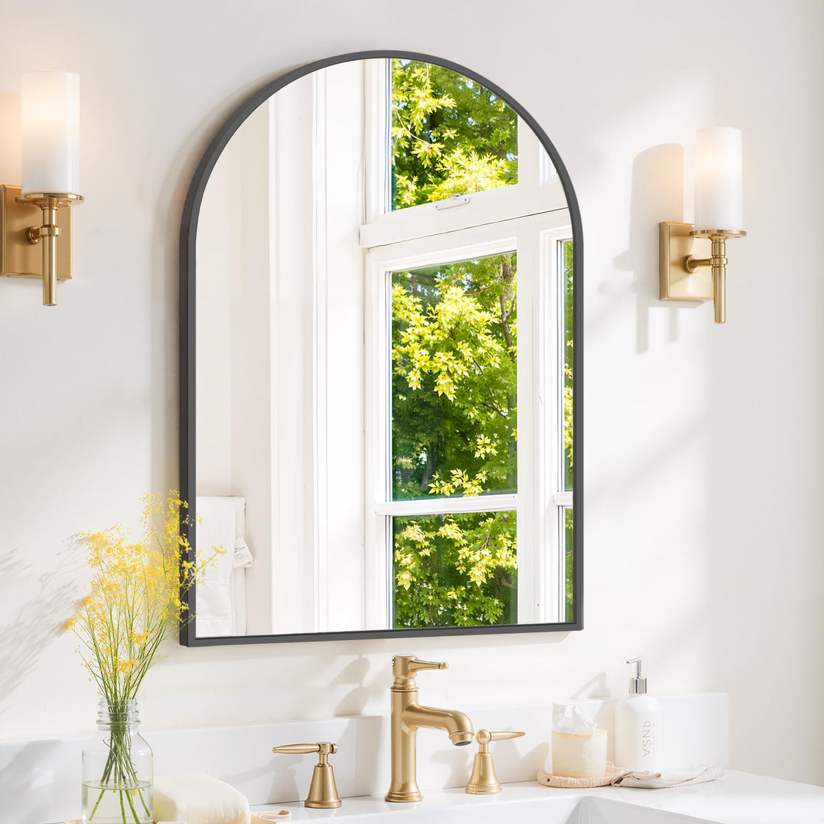 SageNest arched wall mirror with black metal frame brightens compact bathrooms.