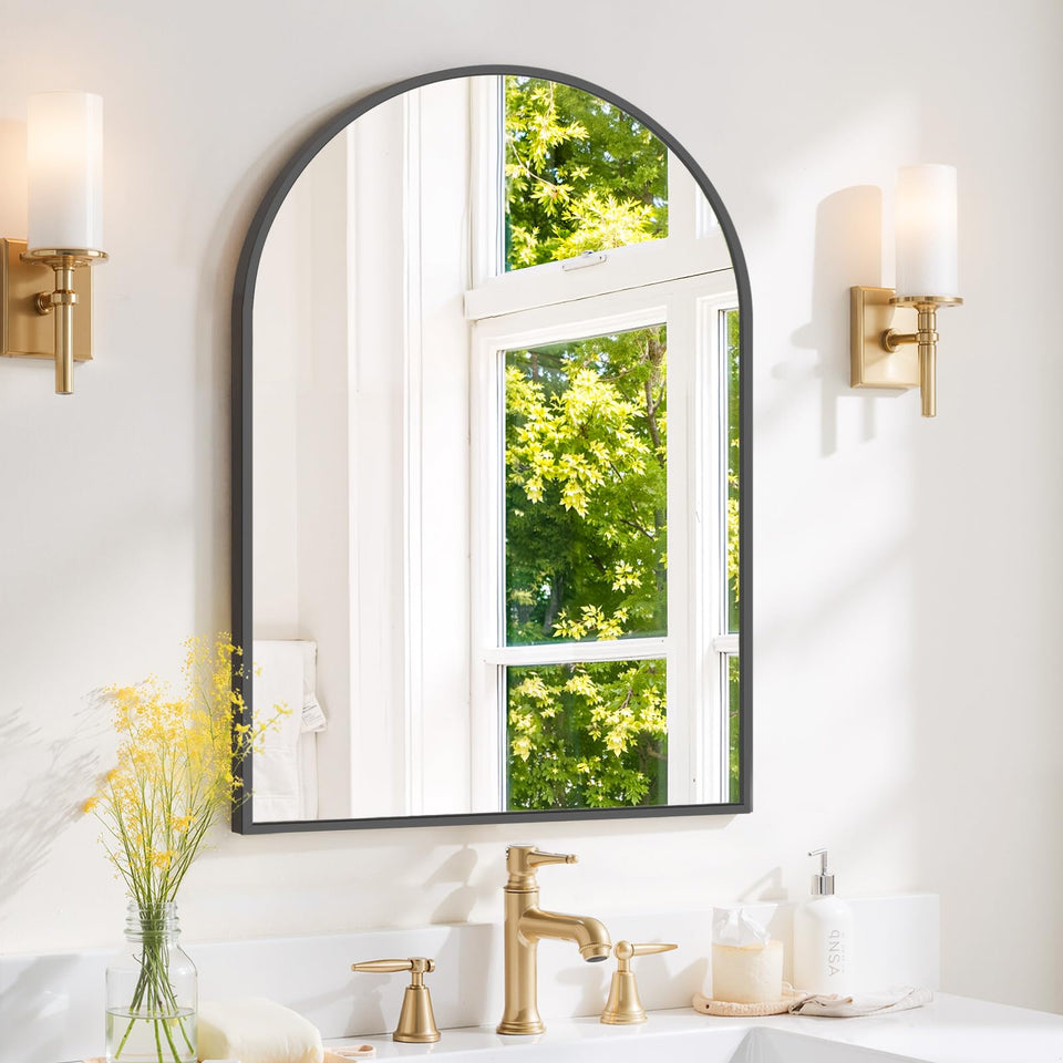 SageNest arched wall mirror with black metal frame brightens compact bathrooms.