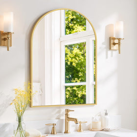 SageNest arched wall mirror with gold frame in a bright entryway, showcasing elegant light reflection