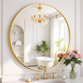 SageNest round wall mirror with gold frame mounted in bathroom for bright reflections.