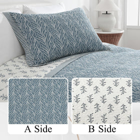 SahSahCasa quilt queen with two pillow shams complements the bed with a cohesive ensemble.