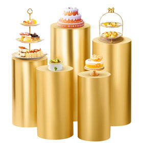 SaitiMade gold cylinder pedestal cover on white stand enhances wedding centerpiece glow