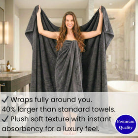 SALBAKOS beach-ready oversized towel on sand for versatility.