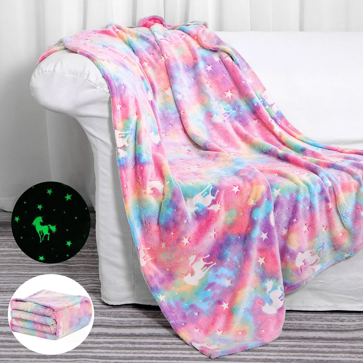 SALIMAH glow-in-the-dark unicorn blanket in pink glows softly for nighttime comfort.