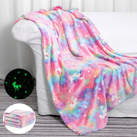 SALIMAH glow-in-the-dark unicorn blanket in pink glows softly for nighttime comfort.