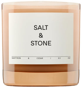Salt & Stone saffron cedar candle jar emits warm aroma for cozy evenings