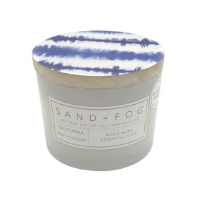 Sand + Fog California Beach House 12oz jar candle enhances living spaces with coastal charm.