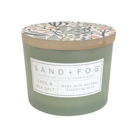 Sand + Fog Sage & Sea Salt 12oz candle jar glows for cozy coastal ambience.
