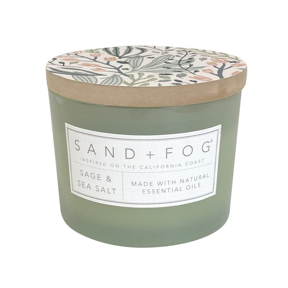 Sand + Fog Sage & Sea Salt 12oz candle jar glows for cozy coastal ambience.