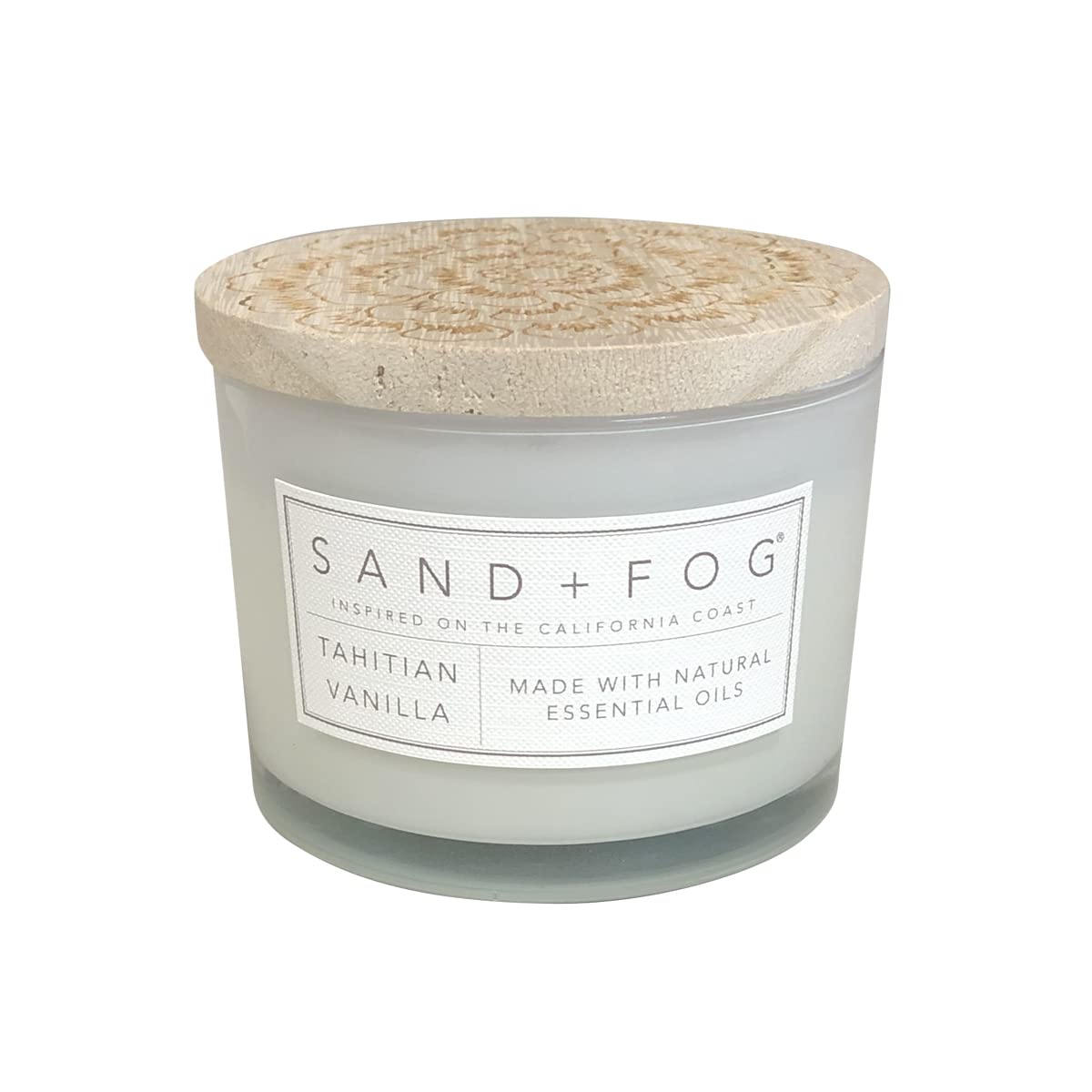 Sand and Fog Tahitian Vanilla candle jar enhances warm ambience.