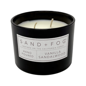 Sand + Fog Vanilla Sandalwood candle glass closeup highlights elegant vessel.