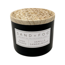 Sand + Fog Vanilla Sandalwood candle with lid art creates refined ambiance.
