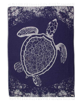 Sand Cloud large Turkish beach towel in Navy Crush Turtle on sand, quick-dry and sand-resistant.