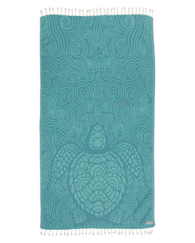 Sand Cloud Turkish Beach Towel Swirl Turtle design dries quickly and resists sand.