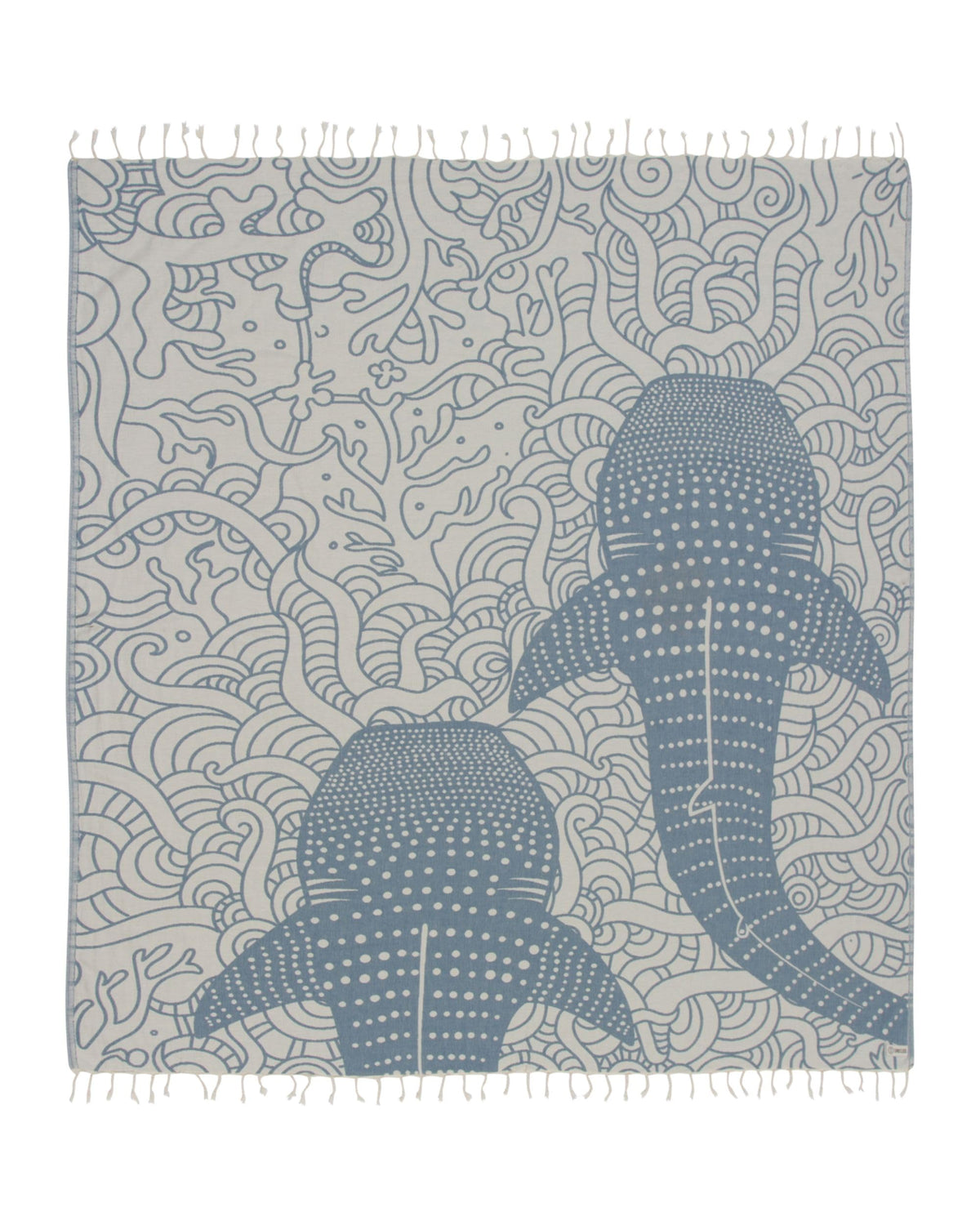 Sand Cloud Whale XL towel folded, compact and travel-ready for easy beach days.
