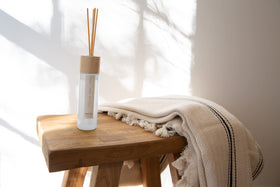 Sand + Fog Ocean Mist diffuser in room capturing ambient fragrance daily