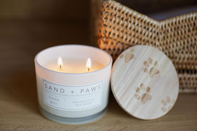 Sand + Paws Ocean Mist candle burn-time text highlights 36 hours of fragrance.