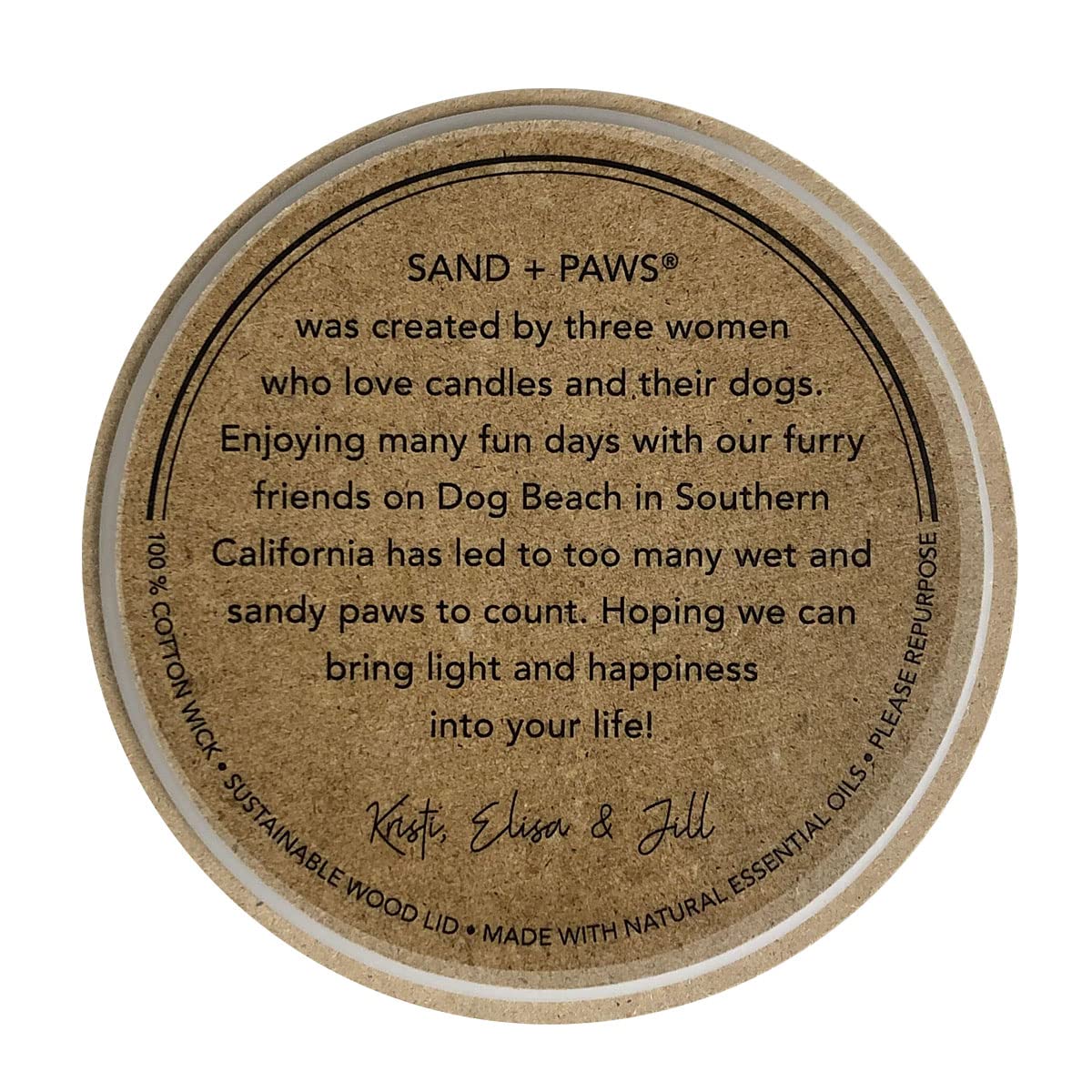 Decorative jar top of Sand + Paws Ocean Mist candle with artwork.