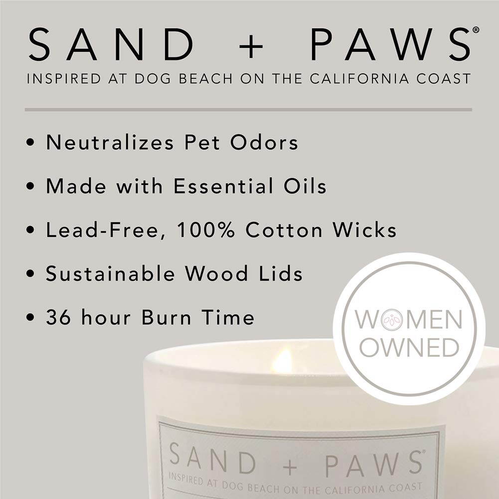 Sand + Paws candle emits a warm amber sandalwood base for cozy ambiance.