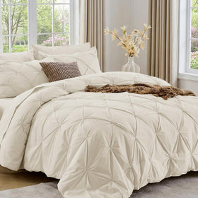 Sasttie California King comforter setup with pintuck design for a luxurious bed look