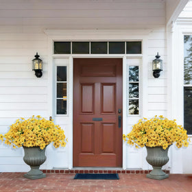 Satefello UV-resistant outdoor artificial flowers maintain bright yellow color.