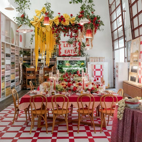 SATINIOR pasta-shaped backdrop creates an inviting Italian ambiance for photos.