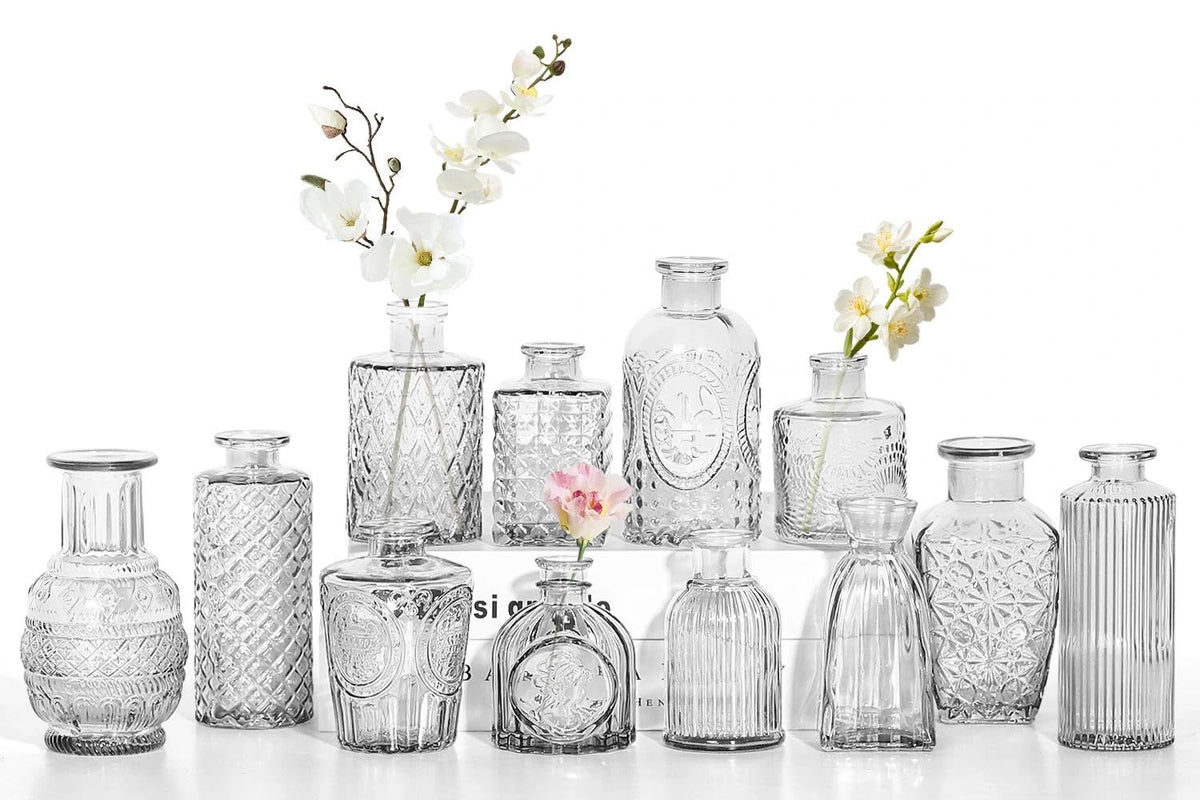 Sawoake 12-piece mini bud vase set with etched patterns for elegant centerpieces.