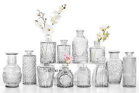 Sawoake 12-piece mini bud vase set with etched patterns for elegant centerpieces.