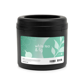 ScentAir Whisper bottle releasing White Tea and Fig for a balanced room aroma.