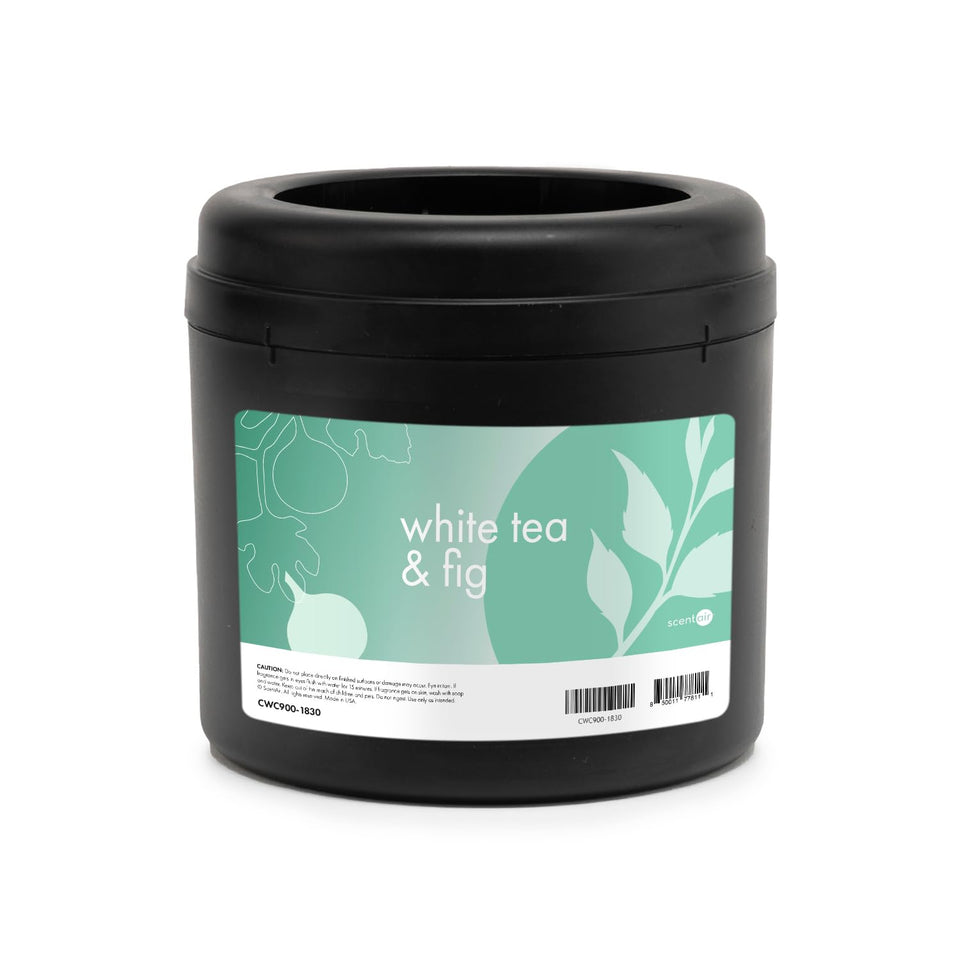 ScentAir Whisper bottle releasing White Tea and Fig for a balanced room aroma.
