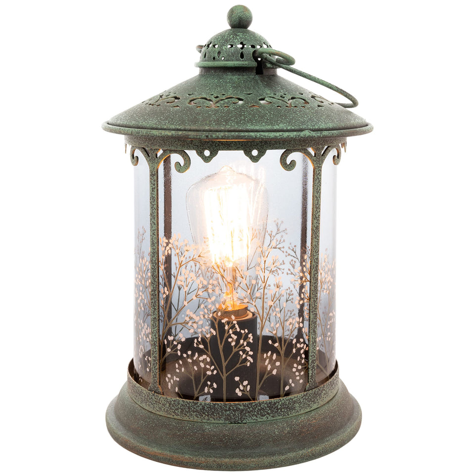 Scentsationals lantern wax warmer decor on table for warm ambience and fragrance.