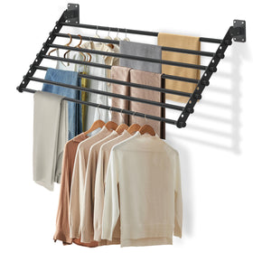 Scisum wall-mounted drying rack folded flat against the wall for easy storage