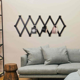 SCUNDA wall rack mounted in hallway for everyday use display.