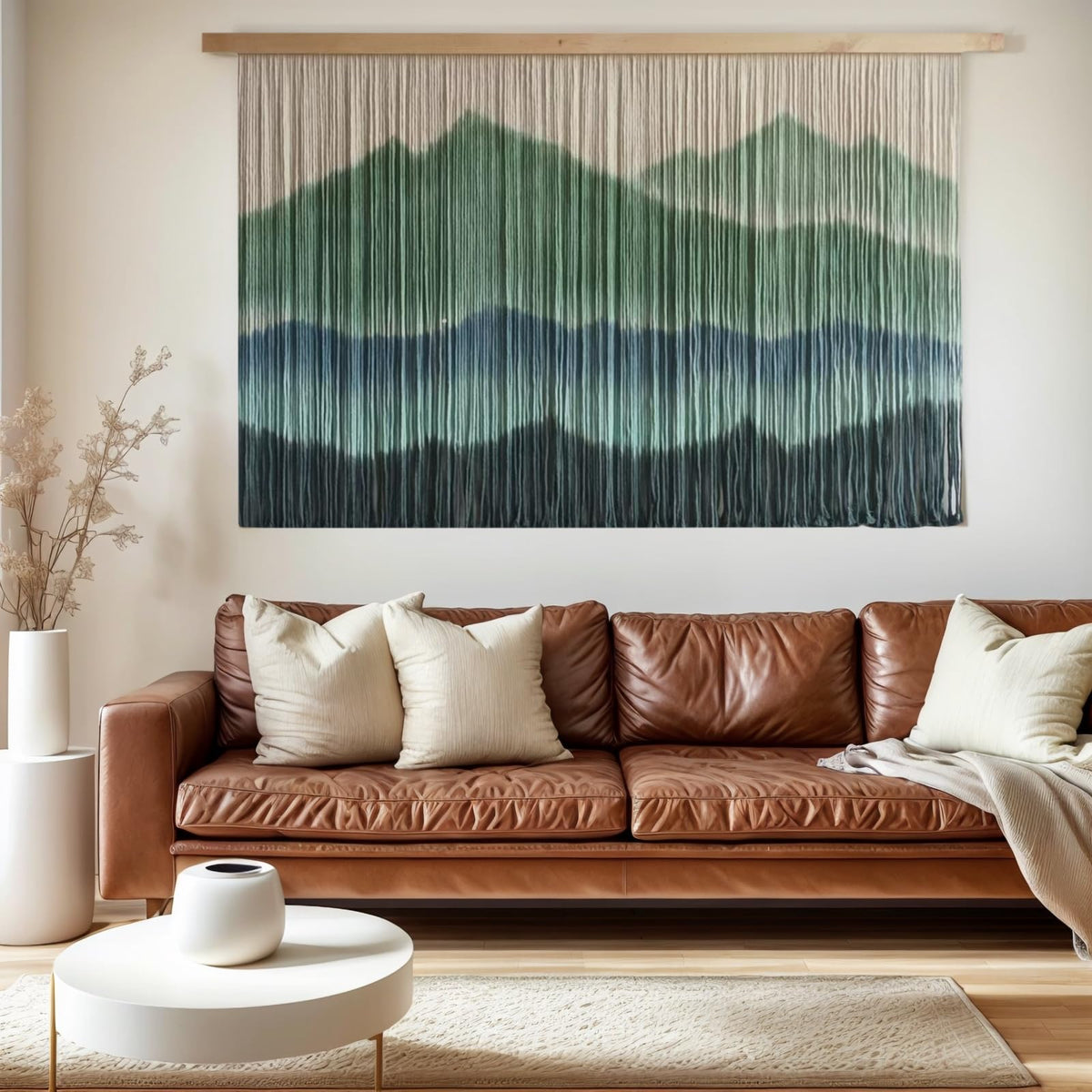 Large Sdjazl macrame tapestry mounted on a wooden dowel for bold wall impact.