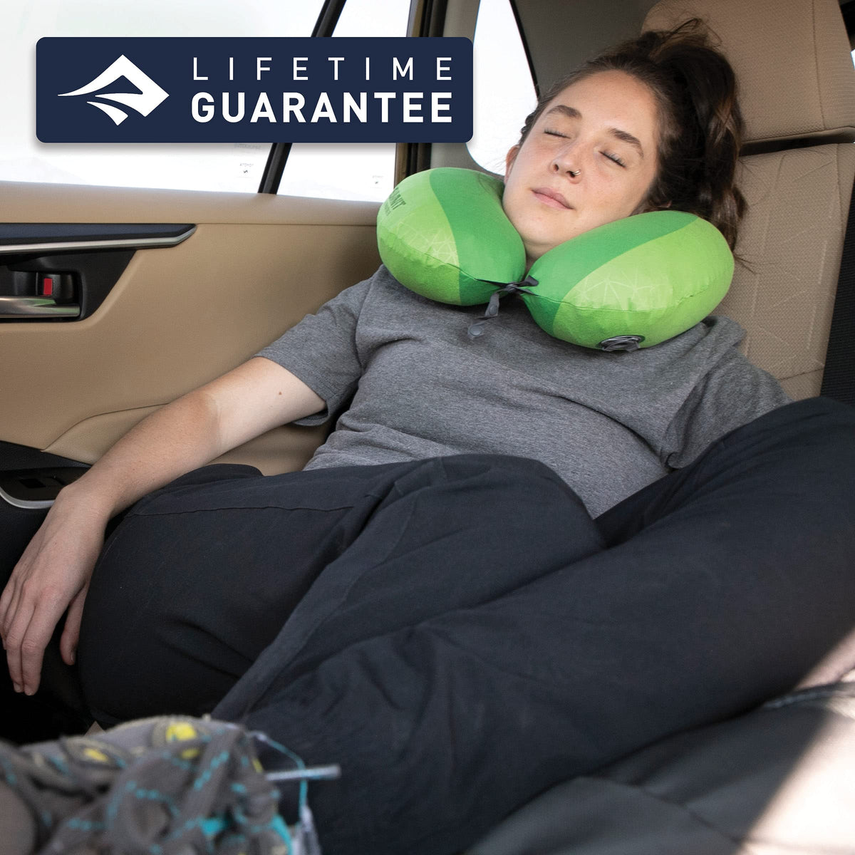 Sea to Summit Aeros magenta pillow inflated, demonstrating compact travel size