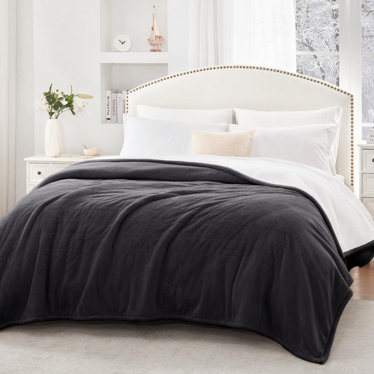 Sealy twin blanket draped on a couch for cozy home use