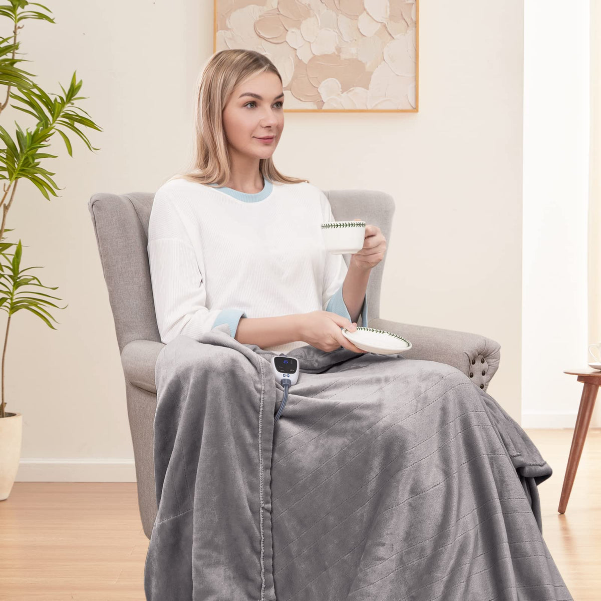 Sealy heated throw blanket cozy home-use setting on sofa emphasizes versatility