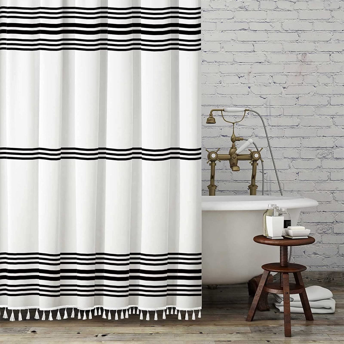 Seasonwood black and white shower curtain with tassels adds modern farmhouse flair.