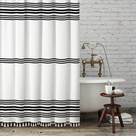Seasonwood black and white shower curtain with tassels adds modern farmhouse flair.