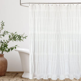 Seasonwood white curtain with pinched pleats adds texture to bathroom