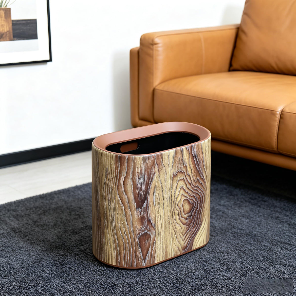 Seebemxx slim oval trash can fits tight spots beside desks.