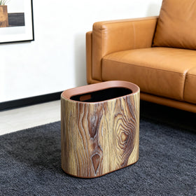 Seebemxx slim oval trash can fits tight spots beside desks.