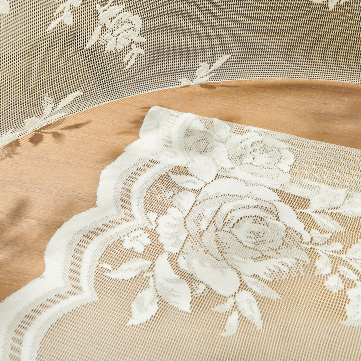 SEEKRIGHT ivory lace curtains displayed in a cozy living area.