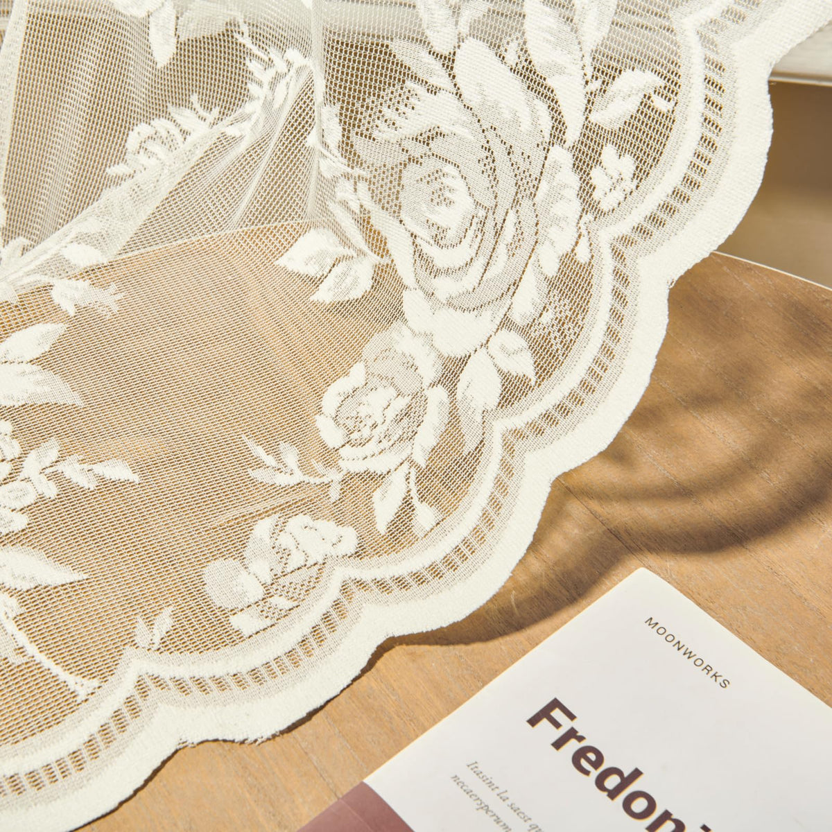 SEEKRIGHT daylight-diffusing lace curtains for a soft, airy feel.