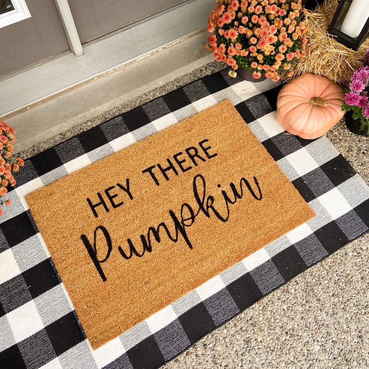 SEEKSEE buffalo plaid detail emphasizes bold black and white pattern.