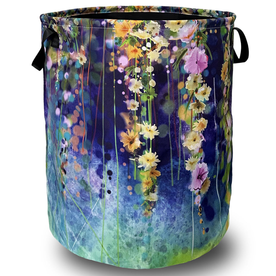 SELIONLIKN floral laundry basket with foldable handles for easy carrying.
