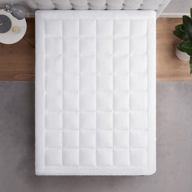 Elastic skirt grips mattress edges for a slip-free night with Serta ComfortSure