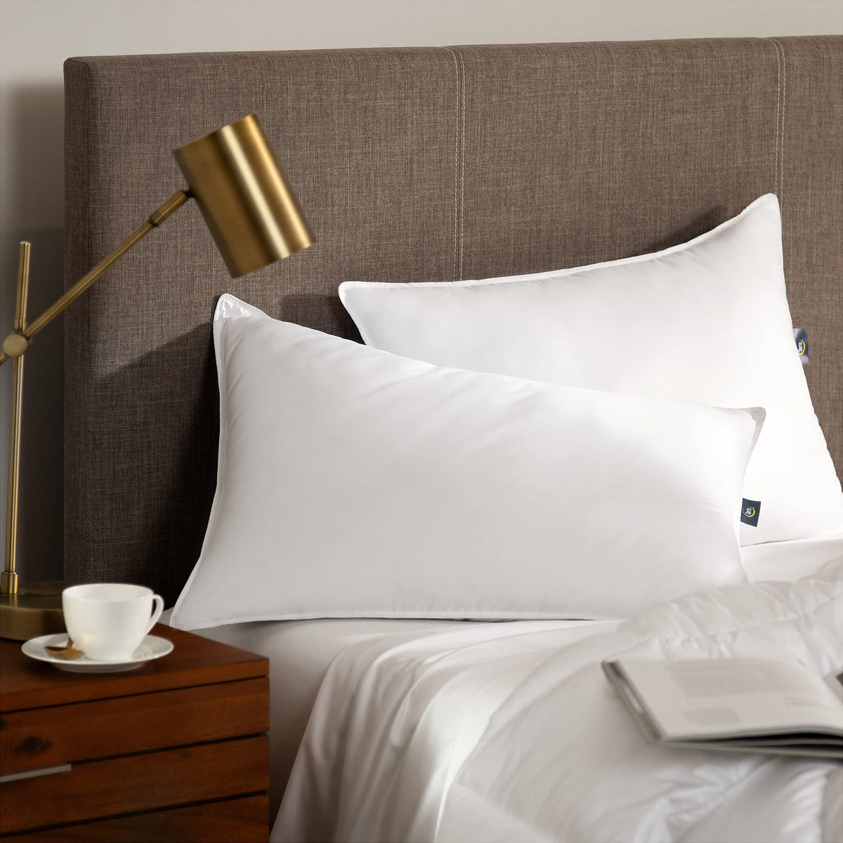 Serta Down Illusion Soft pillow close-up shows plush fluff for cloud-like comfort.
