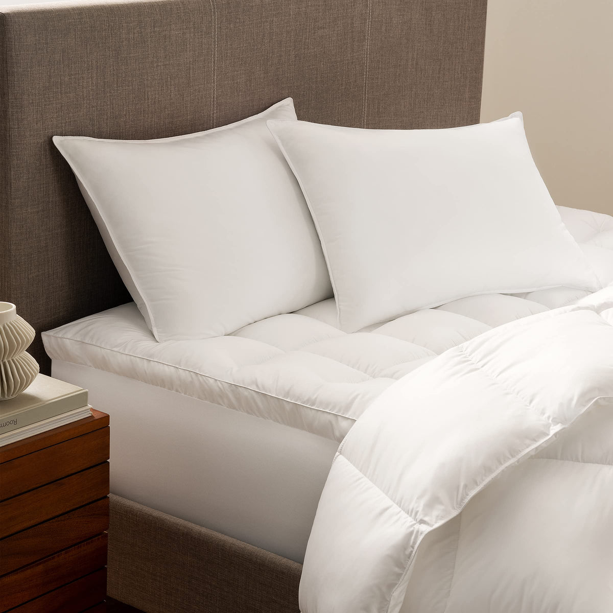 Serta Down Illusion Soft pillow demonstrates side-sleep cradle supporting neck alignment.