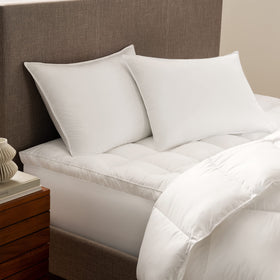Serta Down Illusion Soft pillow demonstrates side-sleep cradle supporting neck alignment.